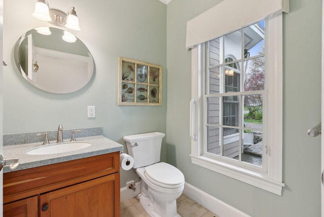 11 Clubhouse Dr, Kennebunk, ME 04043 - bathroom with tile patterned flooring, vanity, baseboards, and toilet