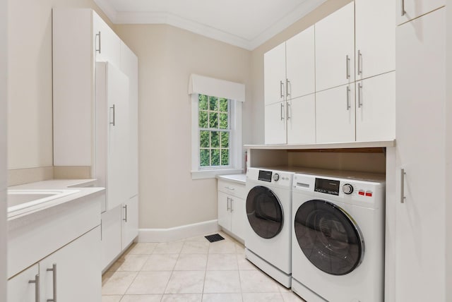11 Clubhouse Dr, Kennebunk, ME 04043 - clothes washing area featuring separate washer and dryer, cabinet space, baseboards, crown molding, and light tile patterned floors