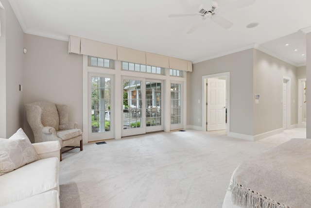 11 Clubhouse Dr, Kennebunk, ME 04043 - unfurnished living room with crown molding, light carpet, baseboards, a ceiling fan, and recessed lighting
