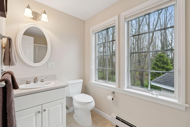 11 Clubhouse Dr, Kennebunk, ME 04043 - bathroom with baseboards, healthy amount of natural light, toilet, and vanity