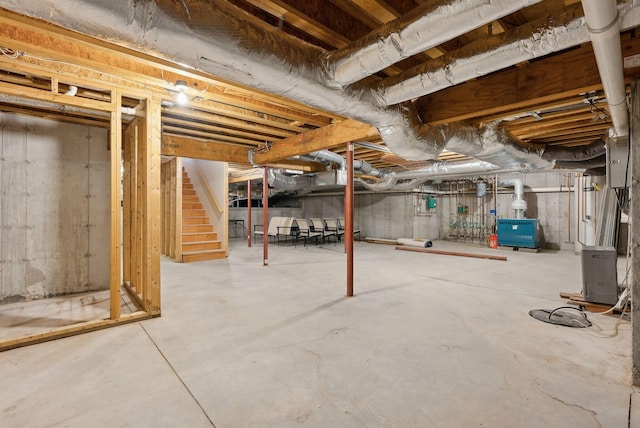 11 Clubhouse Dr, Kennebunk, ME 04043 - unfinished below grade area featuring stairway