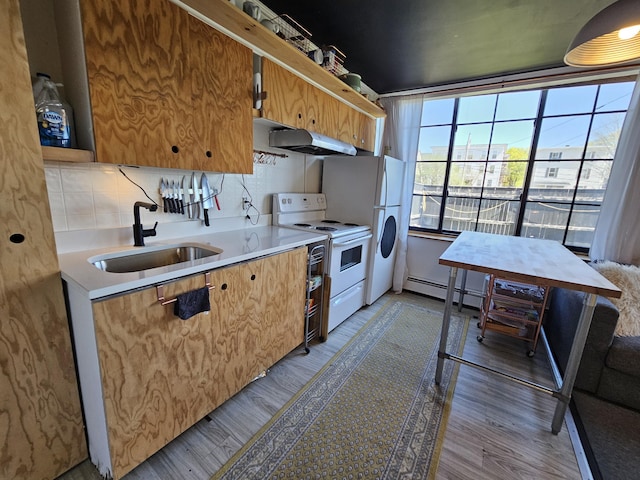 58 Cedar St, Bangor, ME 04401 - kitchen featuring a sink, white range with electric stovetop, under cabinet range hood, and light wood-style floors