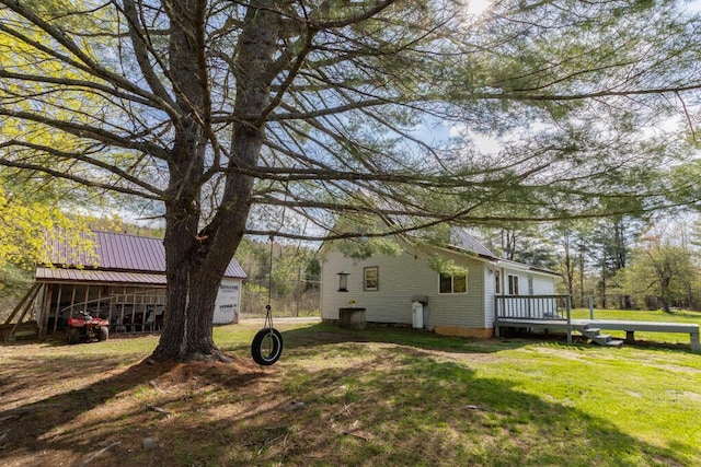 283 School St, Weld, ME 04285 - view of green lawn featuring a deck