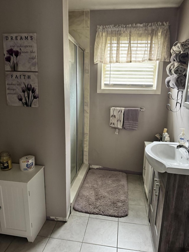 27 Trestle Rd, Medford, ME 04463 - bathroom with vanity, a stall shower, tile patterned flooring, and baseboards