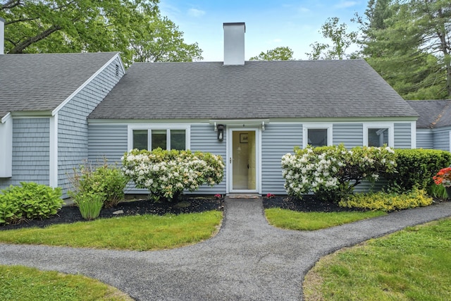 4 Oakview Dr Unit 4, Cape Elizabeth, ME 04107 - cape cod house featuring a chimney and roof with shingles