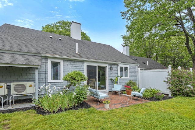4 Oakview Dr Unit 4, Cape Elizabeth, ME 04107 - rear view of property featuring a chimney, a shingled roof, a patio, and ac unit