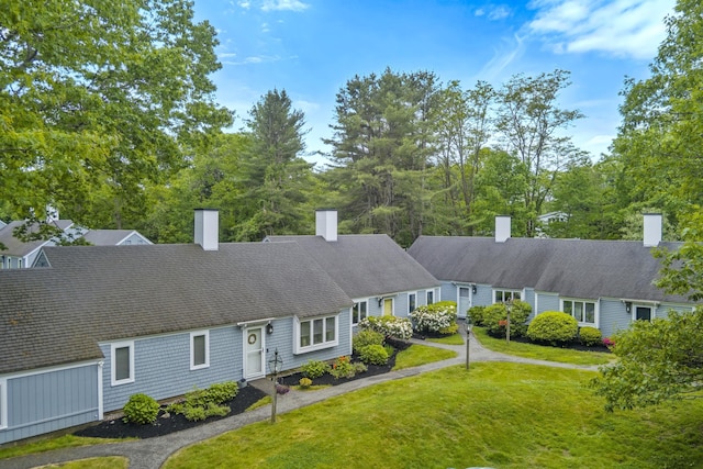 4 Oakview Dr Unit 4, Cape Elizabeth, ME 04107 - view of front of house with a front lawn and a chimney