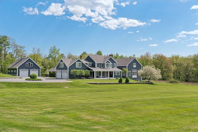 10 Jameson Dr, Falmouth, ME 04105 - colonial house with a front yard, driveway, and a chimney