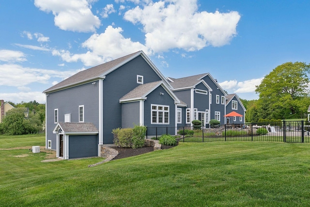10 Jameson Dr, Falmouth, ME 04105 - back of property featuring a garage and cooling unit