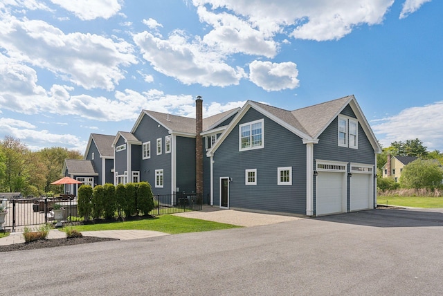 10 Jameson Dr, Falmouth, ME 04105 - view of front of home with a garage and driveway