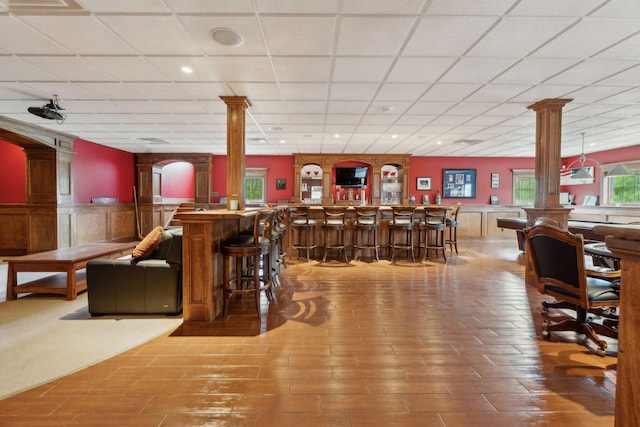 10 Jameson Dr, Falmouth, ME 04105 - community bar area featuring ornate columns, wood finished floors, a paneled ceiling, and recessed lighting