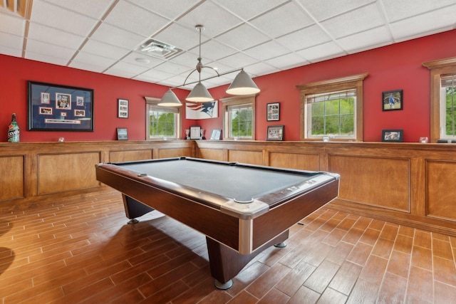 10 Jameson Dr, Falmouth, ME 04105 - rec room featuring a paneled ceiling, wood finished floors, healthy amount of natural light, billiards table, and a wainscoted wall