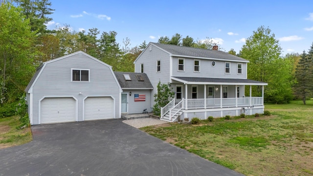 13 Wildbrook Dr, Biddeford, ME 04005 - view of front of home with a porch, a chimney, a garage, roof with shingles, and a gambrel roof