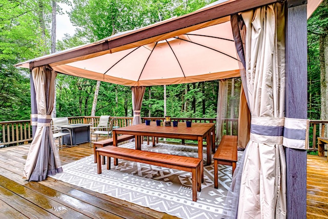 134 Valhalla Ln, Norway, ME 04268 - wooden deck featuring a gazebo and outdoor dining area