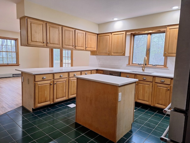 20 Brandywine Cir, Auburn, ME 04210 - kitchen with a sink, a peninsula, light countertops, a kitchen island, and recessed lighting