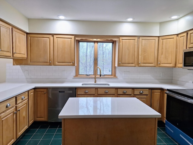 20 Brandywine Cir, Auburn, ME 04210 - kitchen with appliances with stainless steel finishes, a sink, dark tile patterned floors, light countertops, and tasteful backsplash