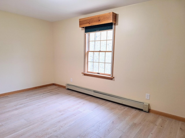 20 Brandywine Cir, Auburn, ME 04210 - empty room with baseboard heating, light wood finished floors, and baseboards