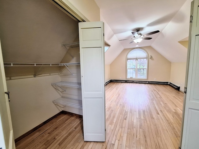 20 Brandywine Cir, Auburn, ME 04210 - additional living space featuring light wood finished floors, ceiling fan, lofted ceiling, and baseboards
