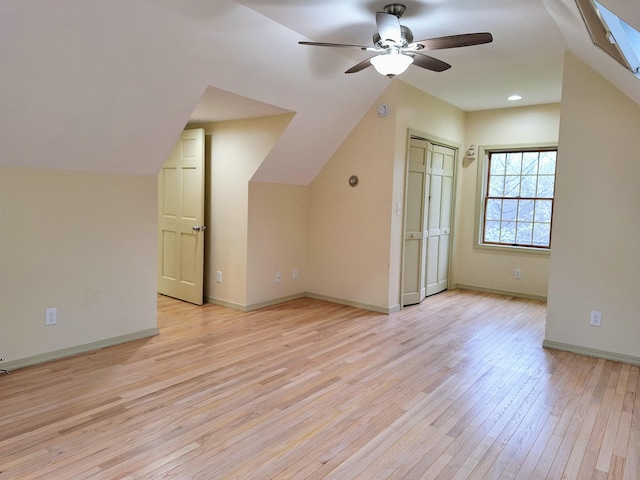 20 Brandywine Cir, Auburn, ME 04210 - additional living space with ceiling fan, light wood-style flooring, vaulted ceiling, and baseboards