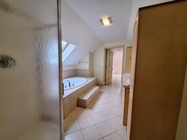 20 Brandywine Cir, Auburn, ME 04210 - bathroom with vaulted ceiling, tile patterned floors, a garden tub, and vanity