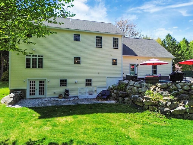 22 Lindas Way, Manchester, ME 04351 - back of property featuring french doors and a lawn