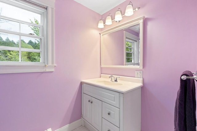 22 Lindas Way, Manchester, ME 04351 - bathroom with healthy amount of natural light, vanity, and baseboards