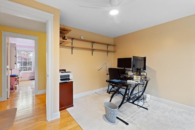22 Lindas Way, Manchester, ME 04351 - home office with ceiling fan, light wood-style floors, baseboard heating, and baseboards