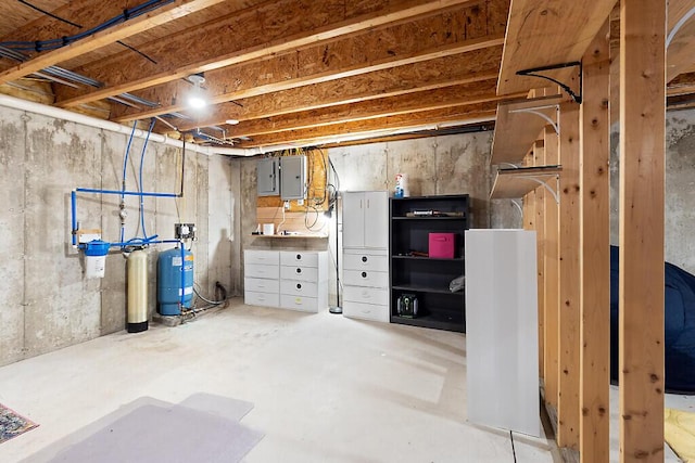 22 Lindas Way, Manchester, ME 04351 - unfinished basement with electric panel and a water pressure tank