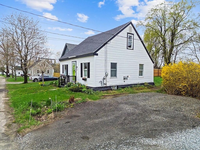 66 Beechwood St, Thomaston, ME 04861 - view of property exterior with a shingled roof