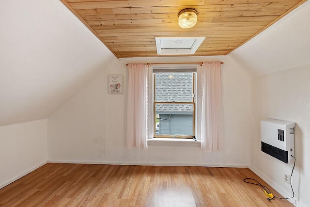 66 Beechwood St, Thomaston, ME 04861 - additional living space featuring wooden ceiling, vaulted ceiling, light wood-style flooring, baseboards, and heating unit