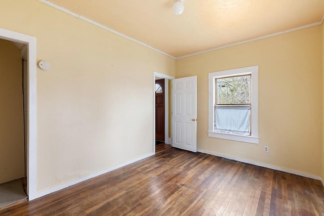 66 Beechwood St, Thomaston, ME 04861 - empty room featuring hardwood / wood-style floors, ornamental molding, and baseboards