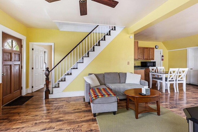 66 Beechwood St, Thomaston, ME 04861 - living area with dark wood-style floors, stairway, a ceiling fan, and baseboards