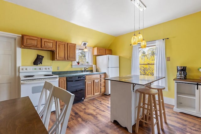 66 Beechwood St, Thomaston, ME 04861 - kitchen featuring white appliances, dark countertops, a sink, dark wood-style flooring, and a kitchen island