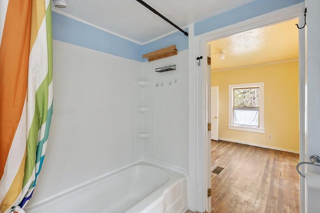 66 Beechwood St, Thomaston, ME 04861 - full bath with hardwood / wood-style floors, bathing tub / shower combination, and baseboards