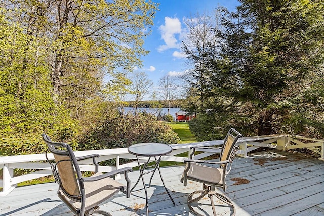 66 Brickett Point Ests, Oakland, ME 04963 - wooden terrace with a water view