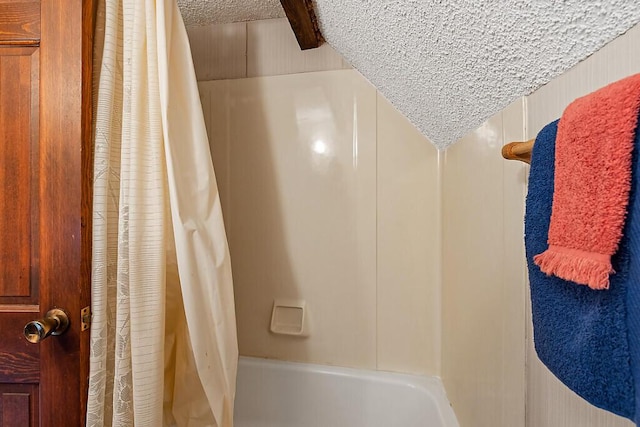 66 Brickett Point Ests, Oakland, ME 04963 - full bathroom featuring a textured ceiling and shower / bath combination with curtain