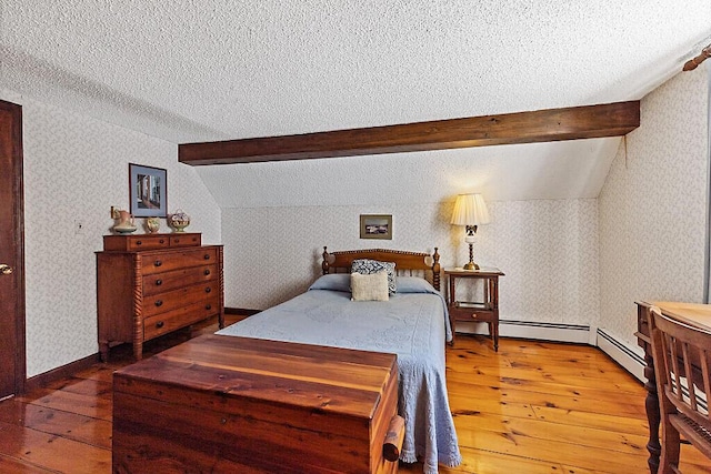 66 Brickett Point Ests, Oakland, ME 04963 - bedroom with wallpapered walls, wood-type flooring, a textured ceiling, and a baseboard radiator