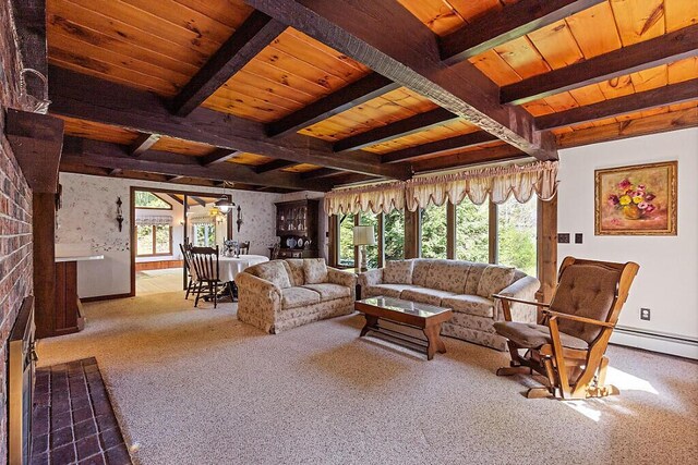 66 Brickett Point Ests, Oakland, ME 04963 - carpeted living room with beamed ceiling, wooden ceiling, baseboards, and a baseboard radiator