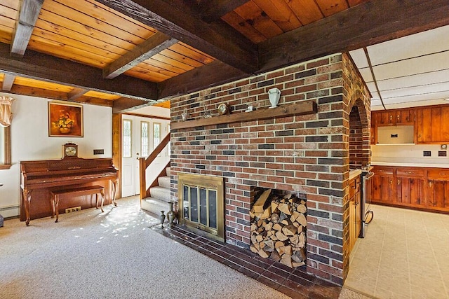 66 Brickett Point Ests, Oakland, ME 04963 - living area featuring a brick fireplace, wooden ceiling, beam ceiling, light colored carpet, and a baseboard radiator
