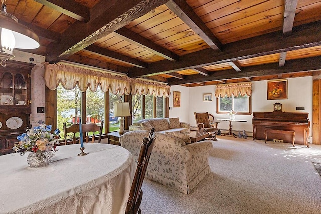 66 Brickett Point Ests, Oakland, ME 04963 - carpeted living room featuring beamed ceiling and wooden ceiling