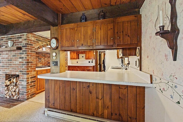 66 Brickett Point Ests, Oakland, ME 04963 - kitchen with brown cabinets, light countertops, wood ceiling, a peninsula, and a sink