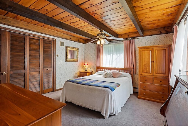 66 Brickett Point Ests, Oakland, ME 04963 - bedroom with wallpapered walls, light carpet, multiple windows, wooden ceiling, and beamed ceiling