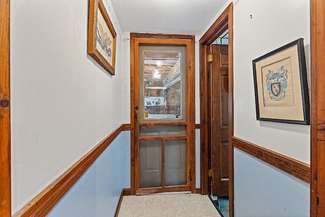 66 Brickett Point Ests, Oakland, ME 04963 - corridor with wainscoting and light tile patterned flooring