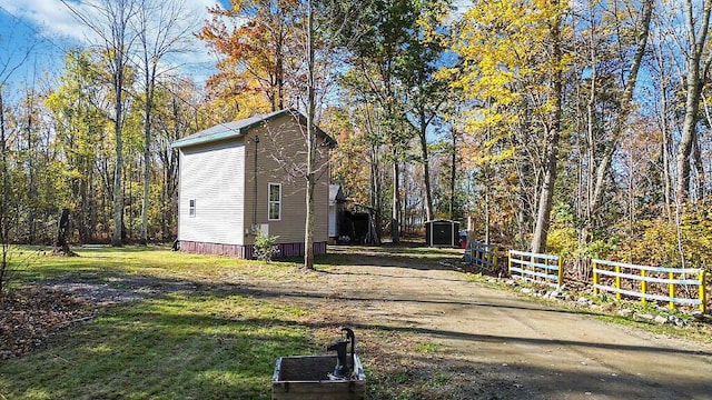 194 Birch Ln, Unity, ME 04988 - view of side of property with a shed and an outbuilding