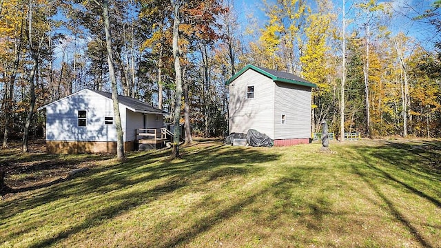 194 Birch Ln, Unity, ME 04988 - view of green lawn with an outbuilding