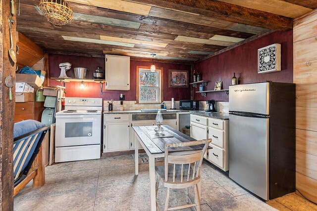 194 Birch Ln, Unity, ME 04988 - kitchen with freestanding refrigerator, open shelves, white range with electric cooktop, wood ceiling, and black microwave