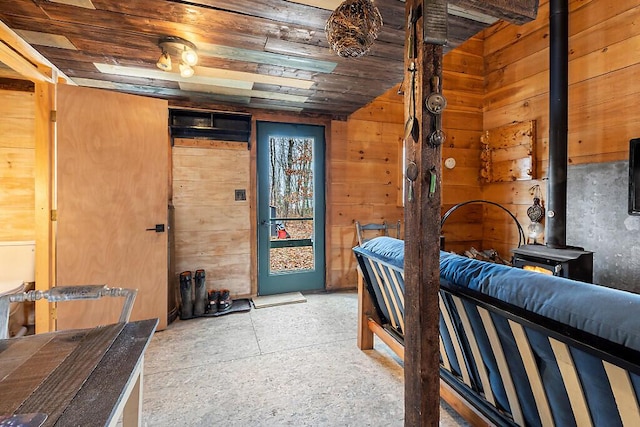 194 Birch Ln, Unity, ME 04988 - interior space featuring a wood stove and wood walls