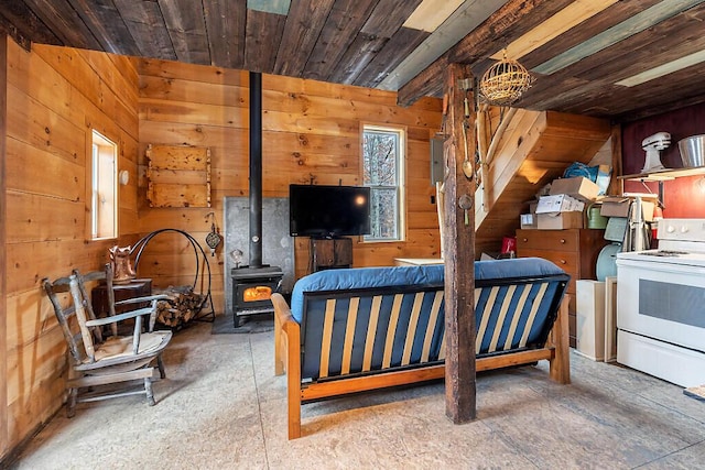 194 Birch Ln, Unity, ME 04988 - bedroom featuring wooden walls, a wood stove, and wooden ceiling