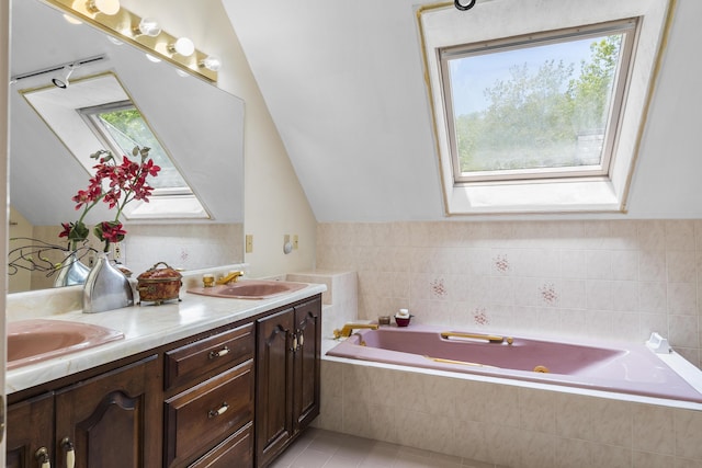 298 Ocean Ave, Kennebunkport, ME 04046 - full bathroom with double vanity, a bath, tile patterned floors, and lofted ceiling