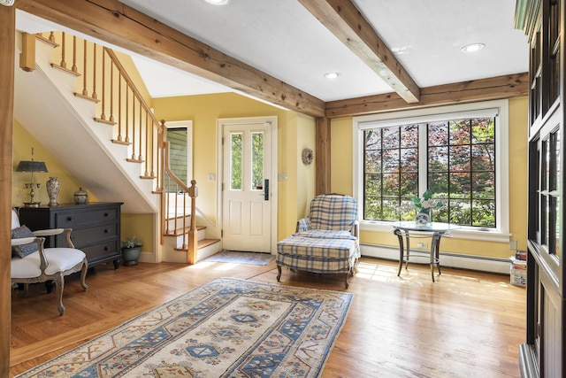 298 Ocean Ave, Kennebunkport, ME 04046 - foyer with stairway, beam ceiling, light wood-type flooring, a baseboard radiator, and recessed lighting